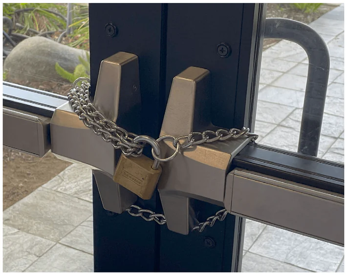 Exit device illegally chained and padlocked on a perimeter door prior to electromagnetic lock adoption