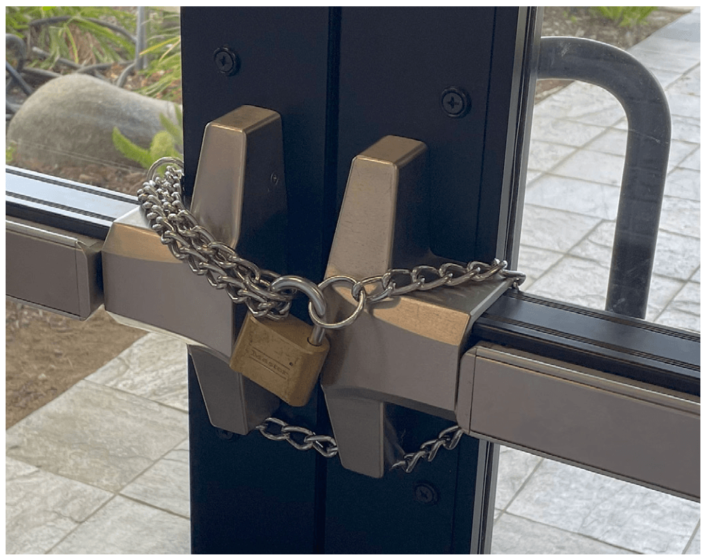 Exit device illegally chained and padlocked on a perimeter door prior to electromagnetic lock adoption
